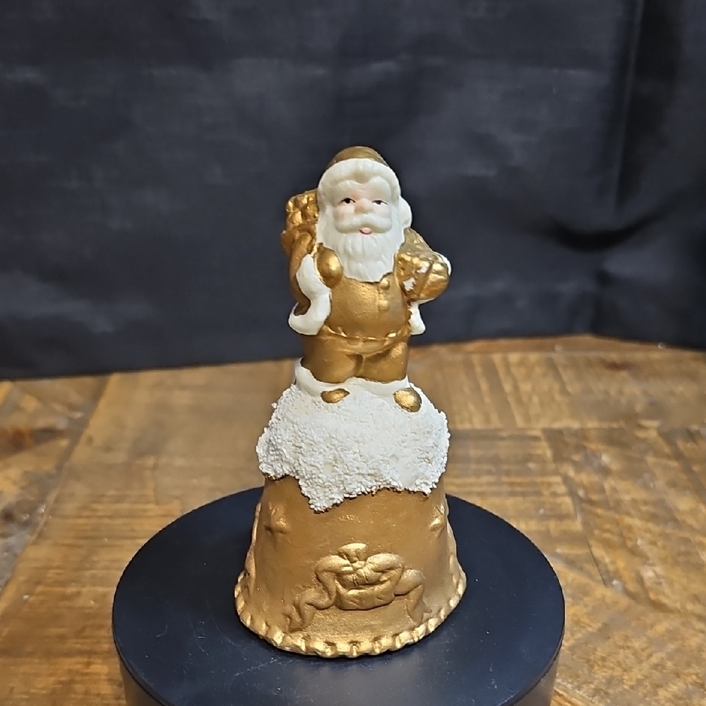 Gold and White Santa Figurine